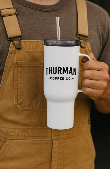 Travel mug with a handle